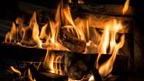 Fire burning inside a residential fireplace