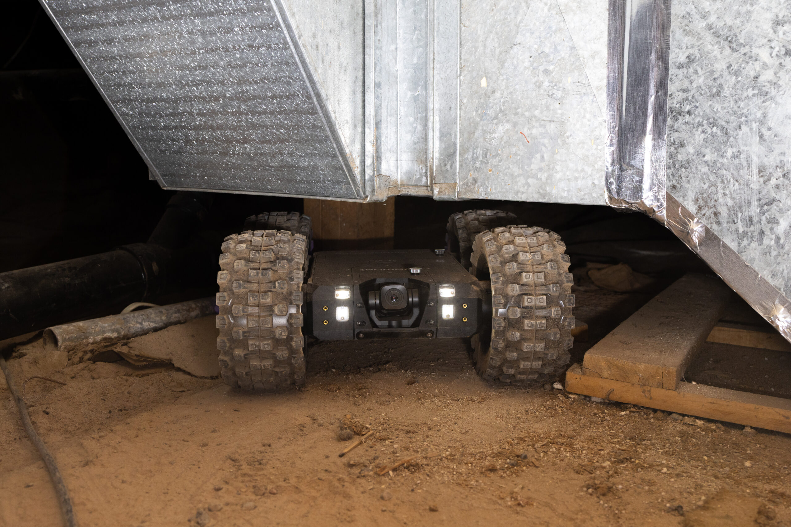 Crawlspace inspection robot in a confined underfloor area